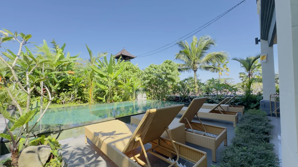 Tropical villa experience at Jambangan Bali Villa Ubud — private pool surrounded by forest
