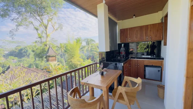 Balcony with panoramic forest views at Jambangan Bali Villa Ubud